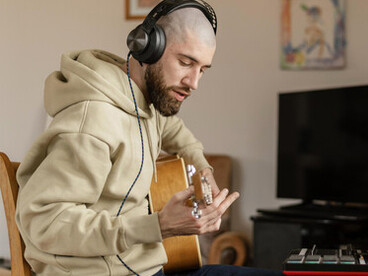 A talented sound artist at work, skillfully crafting immersive music