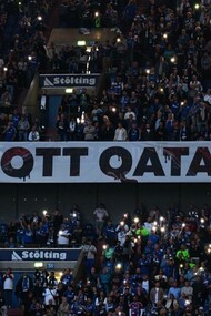 A large banner wishing people to boycott the Qatar World Cup