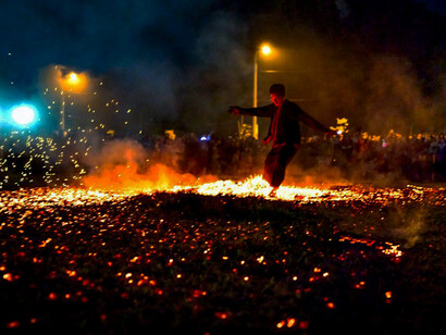 Amidst the chaos of the world, a fiery dance embodies humanity's quest to understand universal laws, seeking harmony with the cosmos