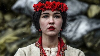 Giorgio Bianchi, Funeral in Kiev: A woman prays in front of a makeshift memorial set up to commemorate those killed in clashes on February 20.