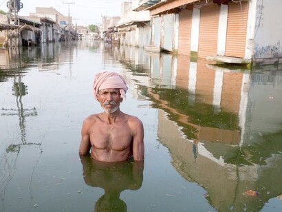 A man covered by water in a flood. The dirt profile across the greater part of the nation was immersed when the huge storm hit in August, Pakistan