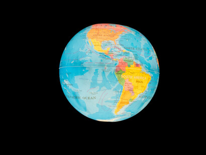 The globe of the world lit from the darkness