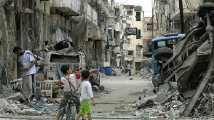 Two kids in a Homs street