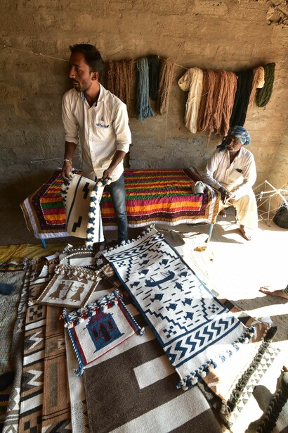 Damabhai Marwada with his carpets @ Ashish Kothari