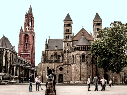 Vrijthof is a large urban square in the heart of Maastricht, Netherlands. Originally a Roman and Frankish cemetery, it later became a semi-private space belonging to the Collegiate Church of Saint Servatius