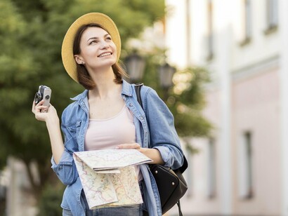 With a camera in one hand and a map in the other, a woman discovers the power of travel to reset the mind and awaken the soul