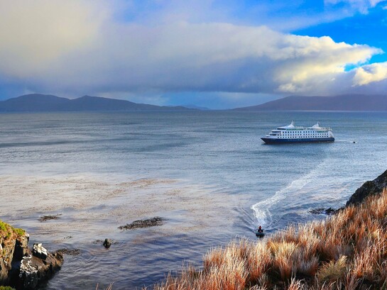 A cruise ship passing through the waters of Cape Horn, Chile, reflecting the region’s pivotal position at the southern tip of South America