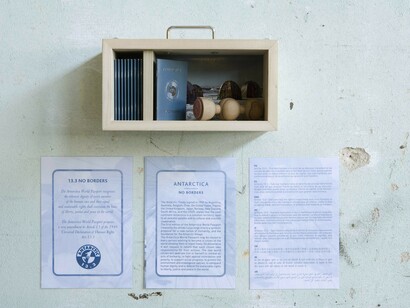 Antarctica World Passport Delivery Kit, 2008-2009
Wooden valise, Lambda photograph laminated, glass, 10 Antarctica World Passports, hand turned wooden passport stamp with rubber embossed motif
Limited edition of 25, 35 x 10 x 20 cm
Courtesy of the artists

