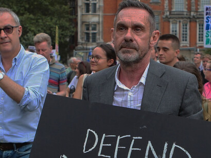 Paul Mason, the author of How to Stop Fascism, defends democracy at a protest