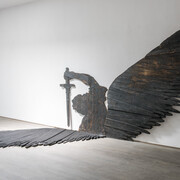 L’Angelo sterimatore,1990,painted wood, cm 290 x 503 x 345. Courtesy of Flora Bigai 