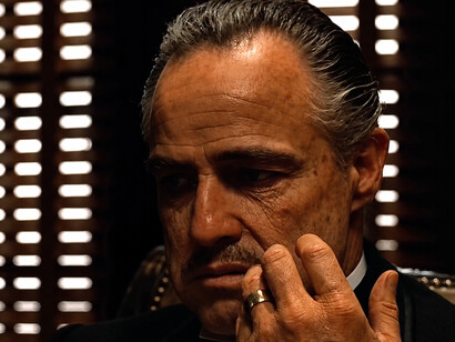 Marlon Brando portrays Vito Corleone in The Godfather (1972), a landmark film that redefined the gangster genre and American cinema