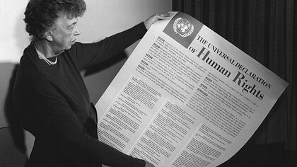 Eleanor Roosevelt holding poster of the Universal Declaration of Human Rights, Lake Success, New York. November 1949