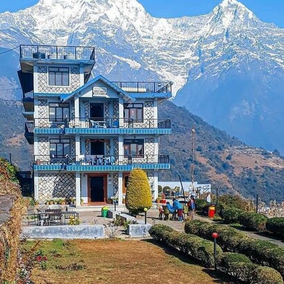 Snow covered Himalayas as viewed from Dhamas Village, India