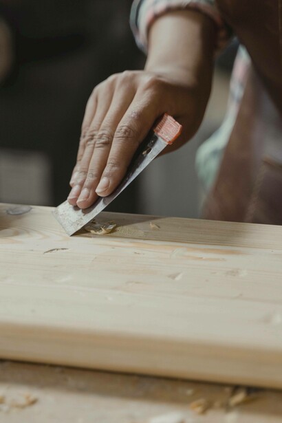 Man finishing woodwork project