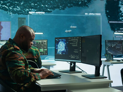 A cybersecurity team operating in an advanced military command center