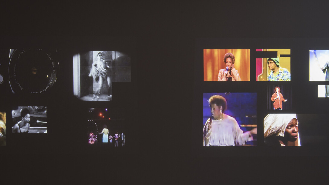 Mickalene Thomas, Do I Look Like a Lady? (Comedians and Singers), 2016. 2-channel HD video
projection, 12:34 minutes, Dimensions variable; each projection 72 x 132 inches. Courtesy the artist;
Lehmann Maupin, New York and Hong Kong; and Artist Rights Society (ARS), New York.