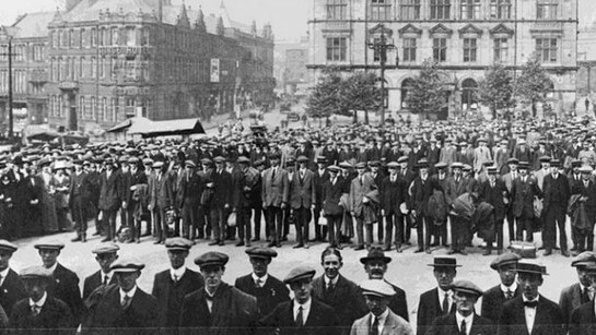 The Preston Pals. Volunteer recruits for a service battalion in civilian clothes, drawn up outside Preston Town Hall during the early months of the First World War, © IWM