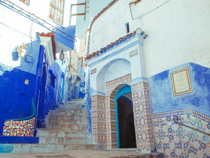 Chefchaouen, Morocco: Blue concrete alley stairs that exemplify the city’s vibrant and distinctive design