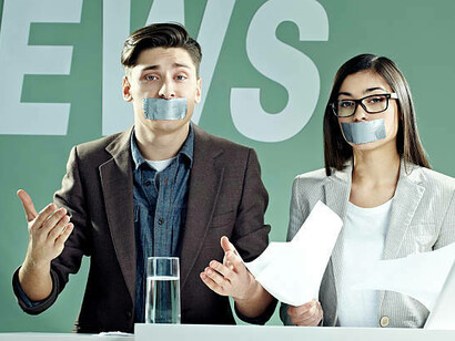 Two reporters with their mouths taped shut represent the growing pressure of censorship in television media