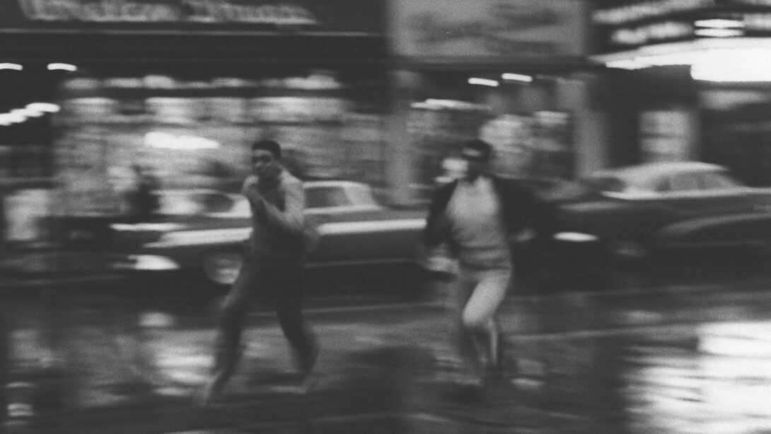 Ann Treer, Untitled (Two Boys Running in the Street), 1963, vintage silver print mounted to board, 9x13.25 inches, © The Estate of Ann Treer. Courtesy Robert Mann Gallery