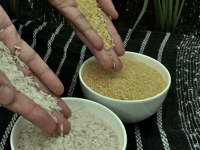 Pouring the two different sets of rice in separate bowls from the Philippines