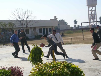 People palying football in a school of Kharar