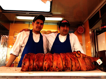 Porchetta being cut