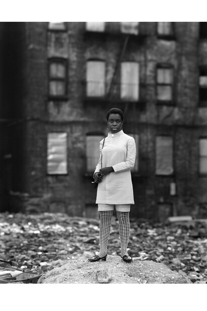 Bruce Davidson, East 100th Street, New York, 1966, gelatin silver print; printed later, 24x20 inches, signed in ink on label affixed to print verso, © Bruce Davidson / Magnum Photos. Courtesy Howard Greenberg Gallery, New York