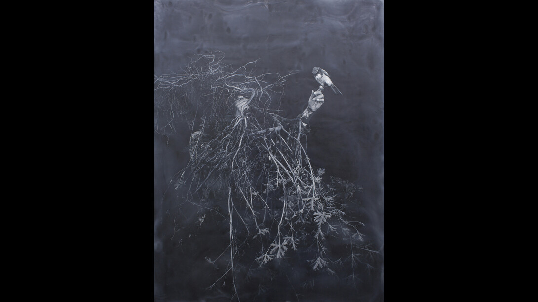 Bessma Khalaf, A bird in the hand.., 2023, archival pigment print, charcoal, chalk, beeswax and damar resin on panel, 24x18x2 inches. Courtesy of the artist and Romer Young Gallery
