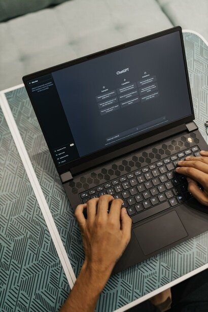 Someone using ChatGPT on a laptop