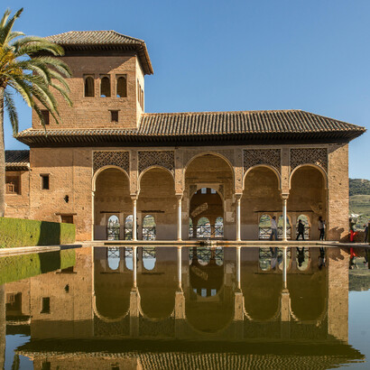 A stunning reflection of the Alhambra Palace in Granada, the heart of historic Andalusia, Spain