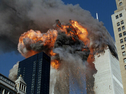 The Twin Towers on fire just before collapsing