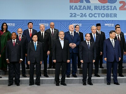 BRICS member states pose for the family photograph at the 16th BRICS Summit, held at the Kazan Expo Center in Russia on October 23, 2024. From left to right: Ethiopian Prime Minister Abiy Ahmed, Egyptian President Abdel Fattah el-Sisi, South African President Cyril Ramaphosa, Chinese President Xi Jinping, Russian President Vladimir Putin, Indian Prime Minister Narendra Modi, and UAE President Mohammed bin Zayed Al Nahyan