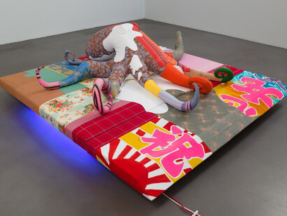 Cosima von Bonin, Total Produce (Morality), 2010. Various fabrics, foam materials, rubber, wood, neon tubes. Octopus: 220 x 220 x 60 cm, Pedestal: 25 x 230 x 250 cm, Courtesy of the artist and MOT International London and Brussels