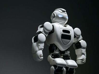 An AI robot presented as the centre of attention, reflecting how models overshadow the pipelines that enable reliability