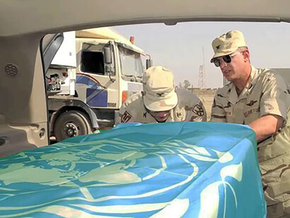 Sergio Vieira de Mello's coffin wrapped in the flag of the United Nations