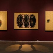 Carlos Rolon, My Father's Wishes (No. 1, No. 2, No. 3), 2014. Wallpaper, wood, mirror, 24 kt. gold leaf, quartz crystals, metal sunglasses and bronzed boxing gloves. No. 1: 50 x 64 inches, No. 2: 80 x 54 inches, No. 3: 50 x 64 inches. Image courtesy of the artist and Paul Kasmin Gallery.