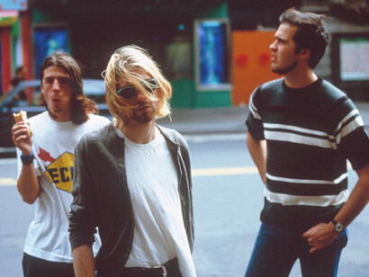 With their disheveled yet distinctive street style, Nirvana helped solidify grunge as more than a music genre, it became a fashion movement, embracing comfort, individuality, and rebellion against the polished glam of the 80s