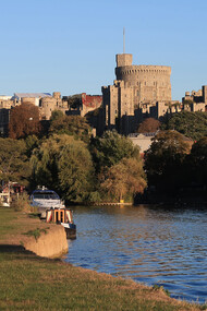 Windsor Castle viewed across the River Thames, reflecting England’s historic royal landscape, UK