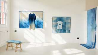 Sustainability Award for my final exhibition, photo by Denisa Ilie, featuring indigo-dyed, upcycled textile collections alongside Jade Guiraud’s guidebook Footprints in the Fells and Louise Keddy’s steel structures 