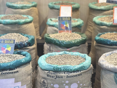 Freshly harvested beans from Majalaya, West Java, await the roasting process, promising to bring out the unique flavours that Suradi's Dunia Kopi is known for