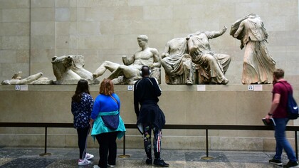 Visitors at the British Museum admiring the Parthenon Marbles