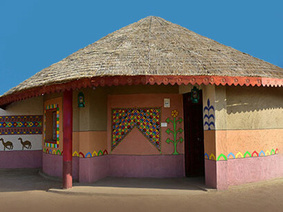 Gandhi nu Gam, Gujarat: circular houses display walls painted with colourful murals