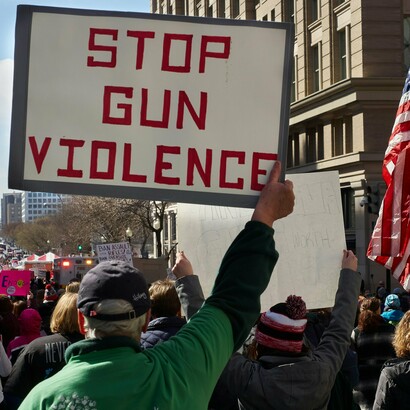 Protesters fill the streets with powerful signs, calling for an end to the devastating toll of gun violence