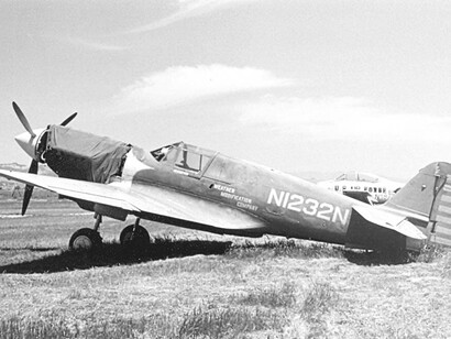 The Curtiss P-40N aircraft, tail number N1232N, served with the Weather Modification Company as one of its cloud-seeding platforms