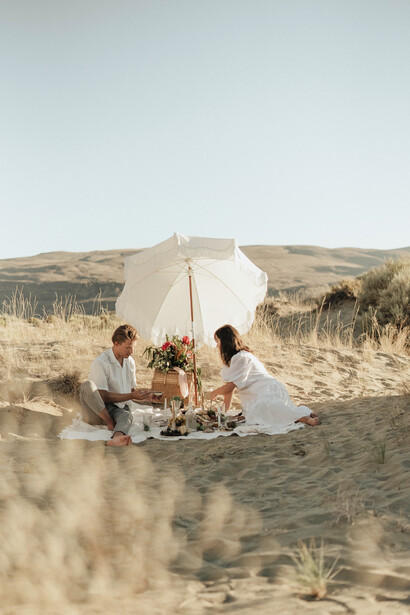 A couple enjoying a picnic in the afternoon