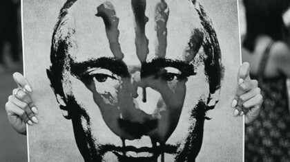 A blood imprint on Vladimir Putin's face, President of Russia