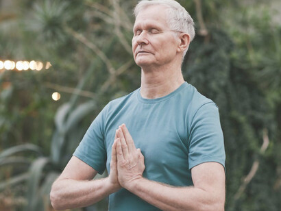 A man turns to yoga as a powerful antidote to combat stress, anxiety, depression, and other mental challenges, recognizing its formidable ability to promote mental well-being