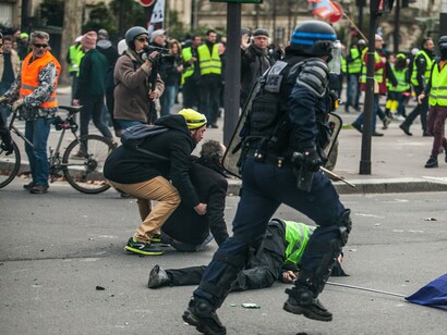 Protesters make their voices heard in the public area, reflecting democracy's protection of diverse viewpoints