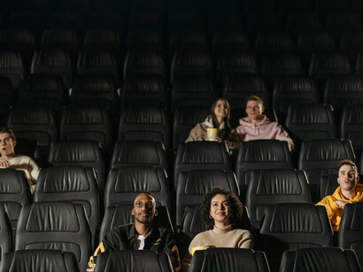 The shared anticipation before the movie begins